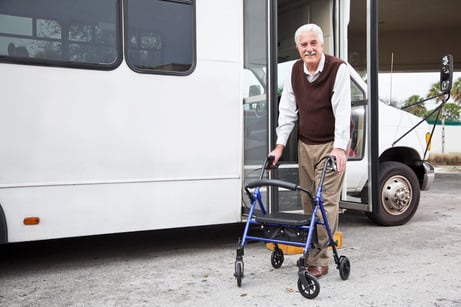 GTFS Blog Image - Senior man with walker near shuttle bus